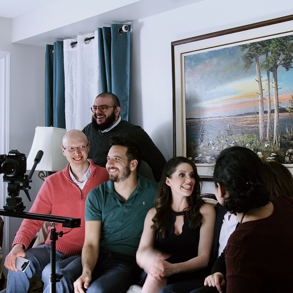 A group filming indoors